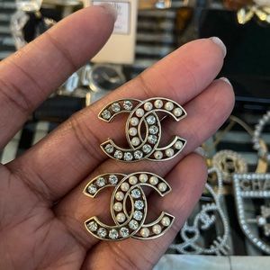 Chanel logo pearl and crystal stud earrings.